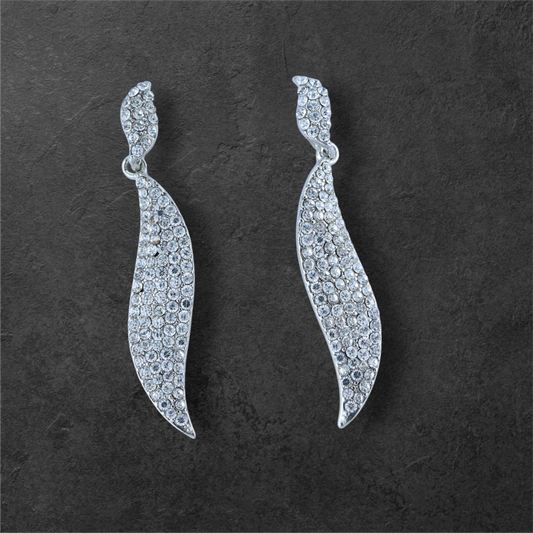 Reet & Riwaz's Shimmery Flame Silver Drop Earrings, zirconia Silver Plated Drops & Danglers for beautiful ladies.