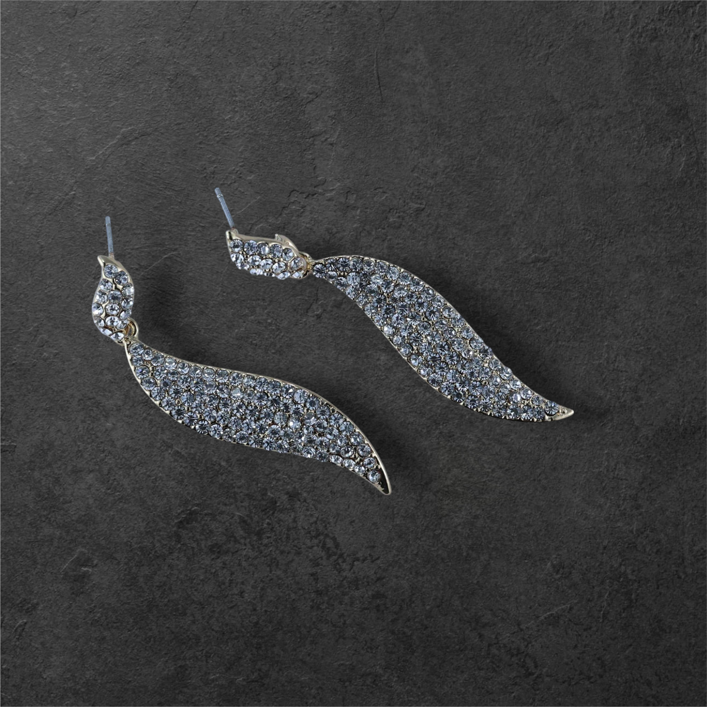 Reet & Riwaz's Shimmery Flame Gold Drop Earrings, zirconia Gold Plated Drops & Danglers for beautiful ladies.