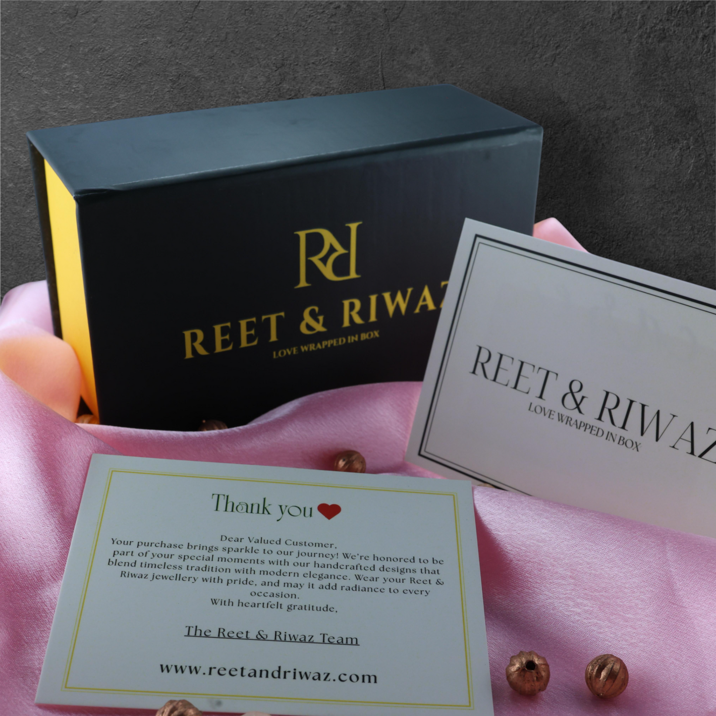 Reet & Riwaz's Shimmery Flame Gold Drop Earrings, zirconia Gold Plated Drops & Danglers for beautiful ladies.